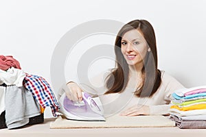 Young pretty housewife. Woman isolated on white background. Housekeeping concept. Copy space for advertisement.