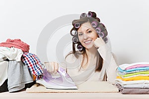 Young pretty housewife. Woman on white background. Housekeeping concept. Copy space for advertisement.