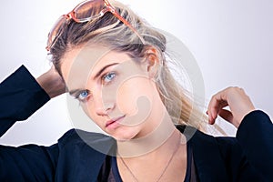 Young pretty lady fashion portrait looking at camera