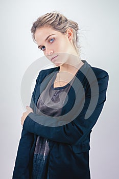 Young pretty lady fashion portrait looking at camera