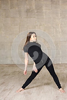 Young pretty modern style dancer.