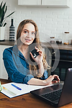 Pregnant girl works at home in self-isolation mode in quarantine and makes online purchases