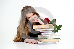 young pretty smart woman with lots of books reading and study. isolated on white background Bored Girl student and pile