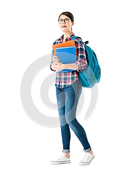 Young pretty student girl looking at empty screen