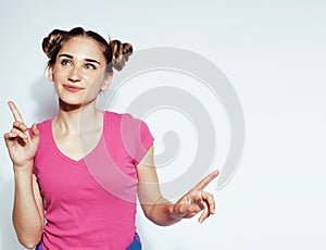 Young pretty stylish brunette hipster girl posing emotional isolated on white background happy smiling cool smile