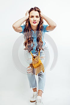 Young pretty stylish hipster girl posing emotional isolated on white background happy smiling cool smile, fashion look