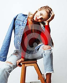 Young pretty stylish hipster girl posing emotional isolated on white background happy smiling cool smile, lifestyle