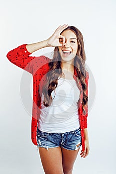 Young pretty stylish hipster girl posing emotional isolated on white background happy smiling cool smile, lifestyle