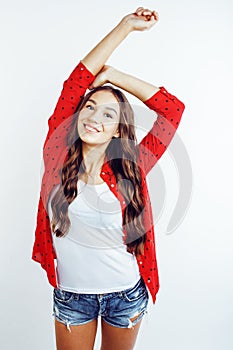 Young pretty stylish hipster girl posing emotional isolated on white background happy smiling cool smile, lifestyle