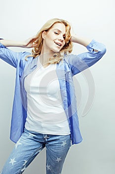 Young pretty stylish hipster teen girl posing emotional isolated on white background happy smiling cool smile, lifestyle