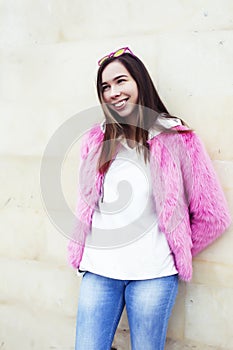 Young pretty teenage brunette girl happy smiling outside, lifestyle people concept