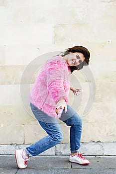 Young pretty teenage brunette girl happy smiling outside, lifestyle people concept