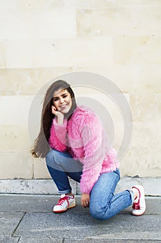 Young pretty teenage brunette girl happy smiling outside, lifestyle people concept