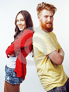 Young pretty teenage couple, hipster guy with his girlfriend happy smiling and hugging isolated on white background