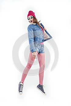 Young pretty teenage girl jumping cheerful isolated on white background, lifestyle people concept