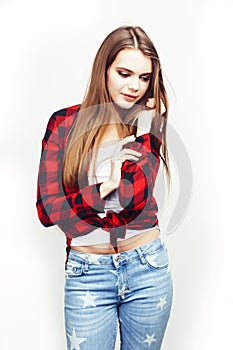 Young pretty teenage hipster girl posing emotional happy smiling on white background, lifestyle people concept