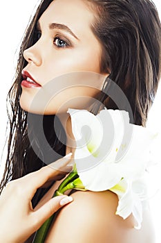 Young pretty woman with Amarilis flower close up isolated on white, hands manicure, spa people concept