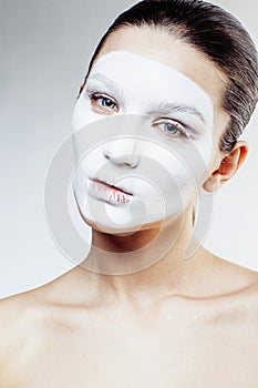 Young pretty woman with facial white mask isolated close up spa, lifestyle people healthcare concept