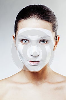 Young pretty woman with facial white mask isolated close up spa, lifestyle people healthcare concept