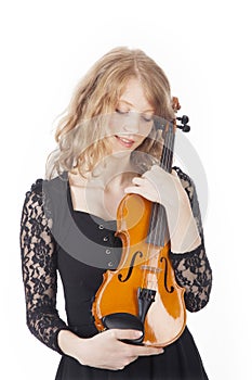 Young pretty woman holding violin