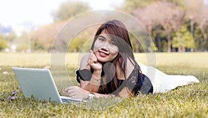 Young pretty woman with laptop