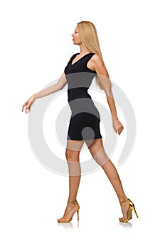 Young pretty woman in mini black dress isolated on