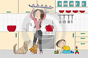 Young and pretty woman mother cooking in the kitchen with dog, cat and her child little boy standing in her way - original