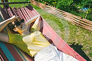 Young pretty woman rest in hammock