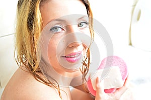 Young pretty woman taking bath