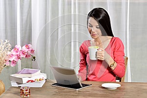 Young pretty woman work in home office