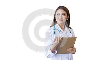 Young professional Asian woman doctor examine report document of patient to plan the next treatment. She is holding clipboard in