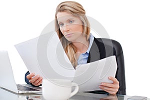 Young professional business woman working at desk