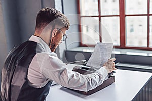 Young professional reading the script