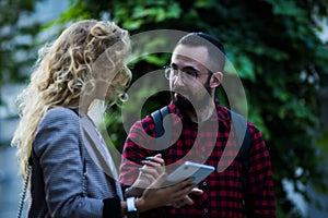 Young professionals having a friendly conversation