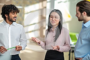 Young professionals working together on the project