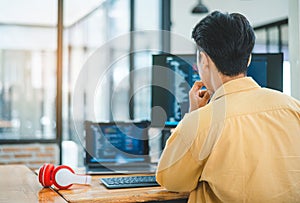 Young programmer working on coding, software development and web design in software company office.Concept technology development