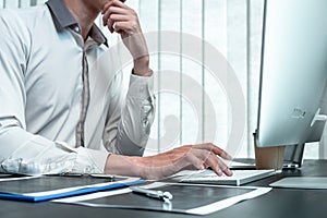 Young Programmer working in software javascript computer in IT office, Writing codes and data code website and coding database