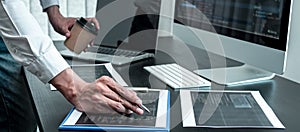 Young Programmer working in software javascript computer in IT office, Writing codes and data code website and coding database