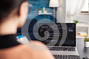 Young programmer writing virtual program code for software development