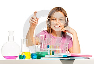 Young pupil studying chemistry in the laboratory