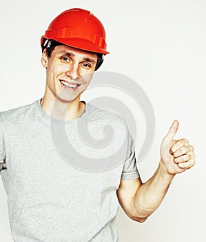 Young real hard worker man isolated on white background on ladder smiling posing, business people concept