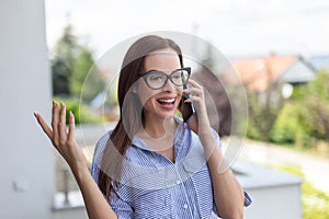 Young realtor woman calling and discuss outdoors