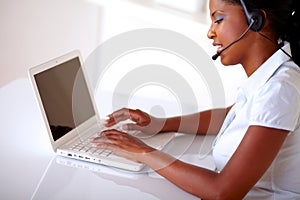 Young receptionist working on customer service