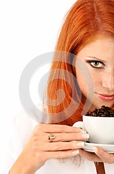 Young red-haired girl and coffee