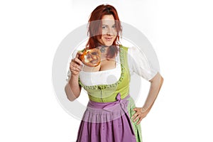 Young red head woman in traditional bavarian costume