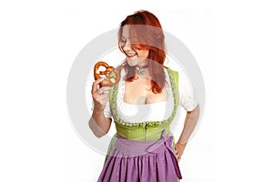 Young red head woman in traditional bavarian costume