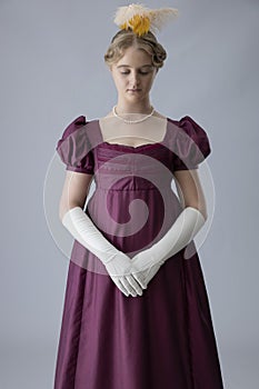 A young Regency woman in a an evening dress photo