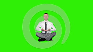 Young relaxed businessman meditating, Green Screen, stock footage