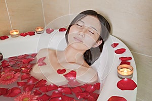 Young Relaxed Woman Bathing at Health Spa