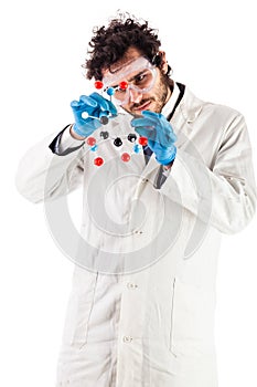 Young researcher assembling a tnt molecule